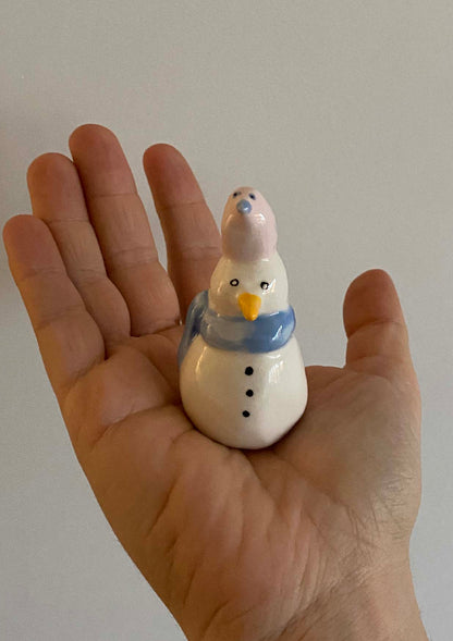 Snowman and his bird